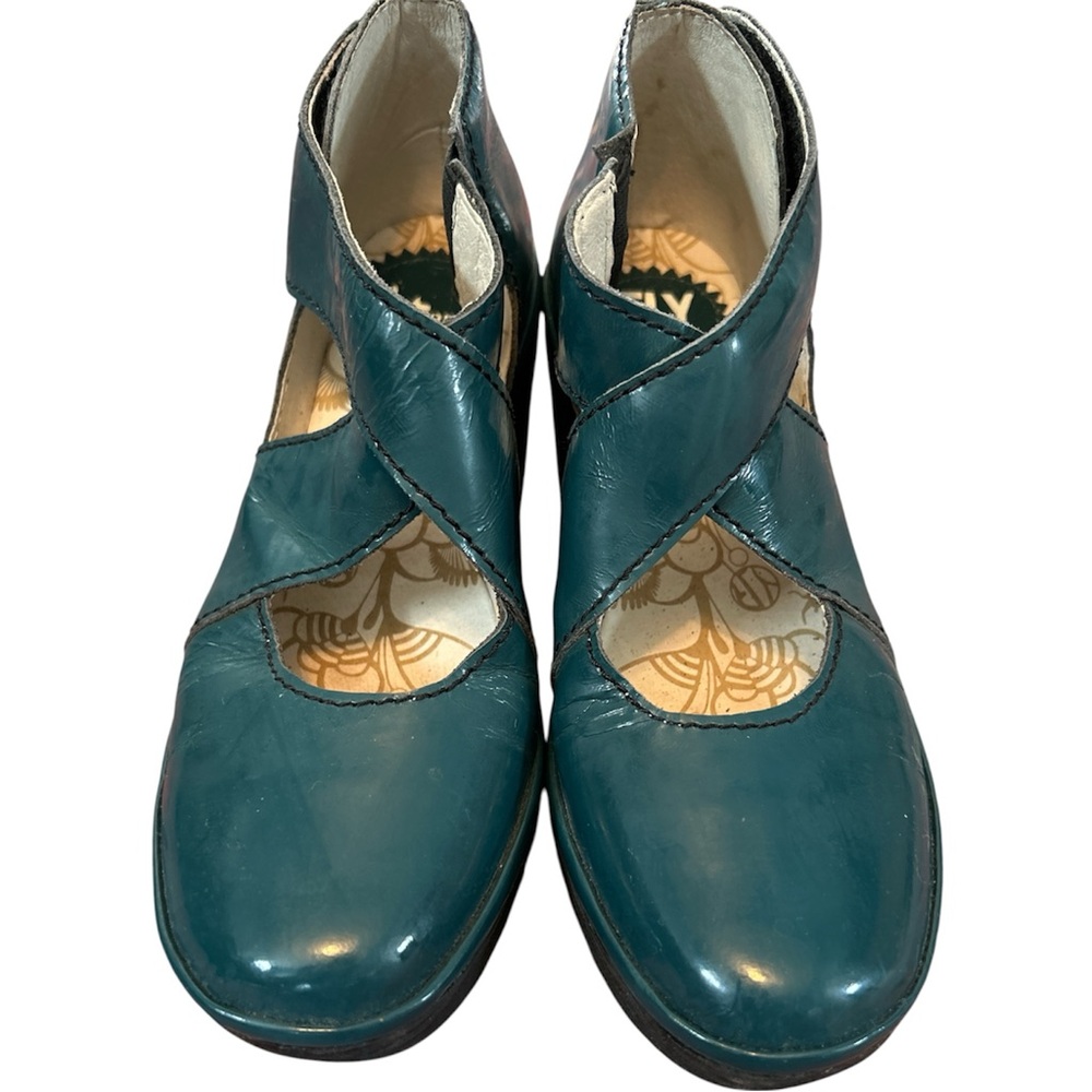 Fly London Teal Patent Leather Crisscross Wedge Shoes